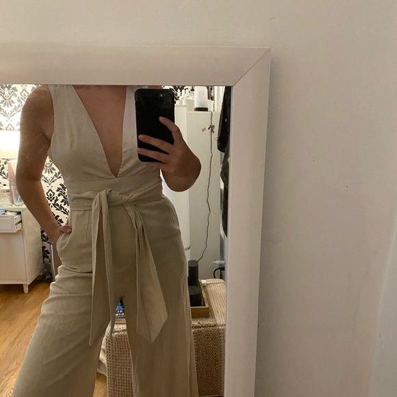 Beige/natural linen flared leg jumpsuit with tie. - Picture 2 of 5